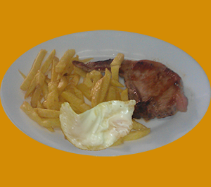 chuleta con dos guarnciones